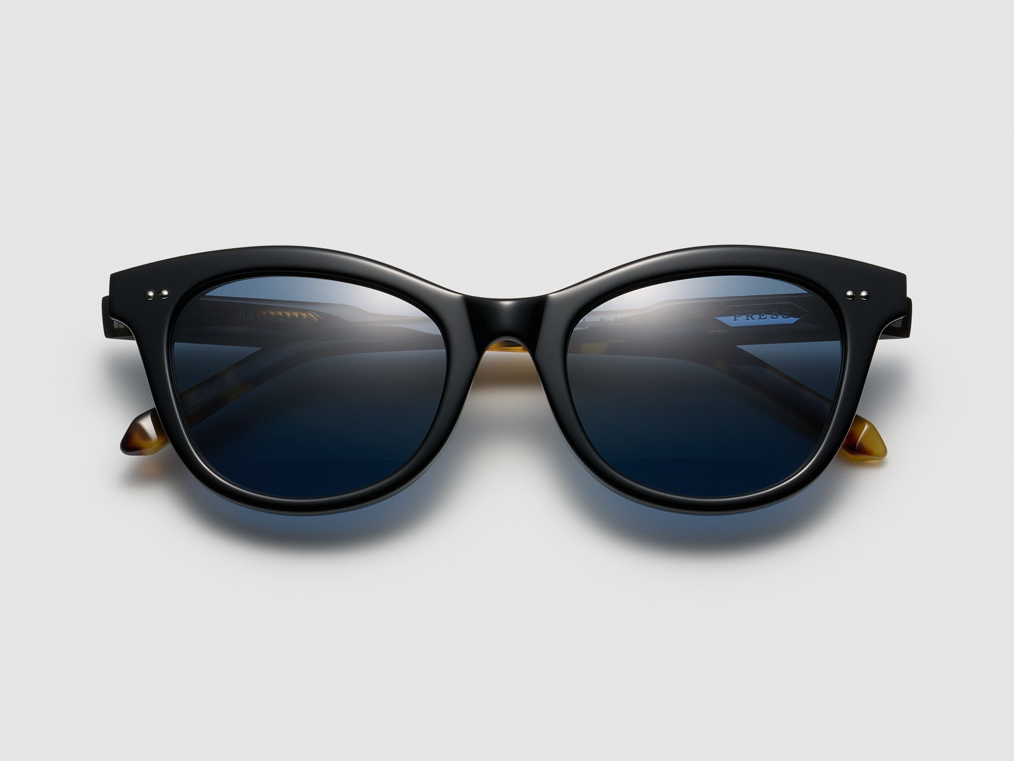 Press The Charade Black Tortoise / Silver