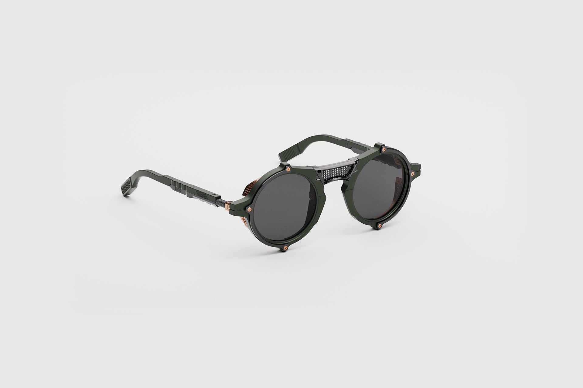 Movitra Nomad 01 sunglasses in C1 Solid Army, three-quarter view showing titanium blinkers